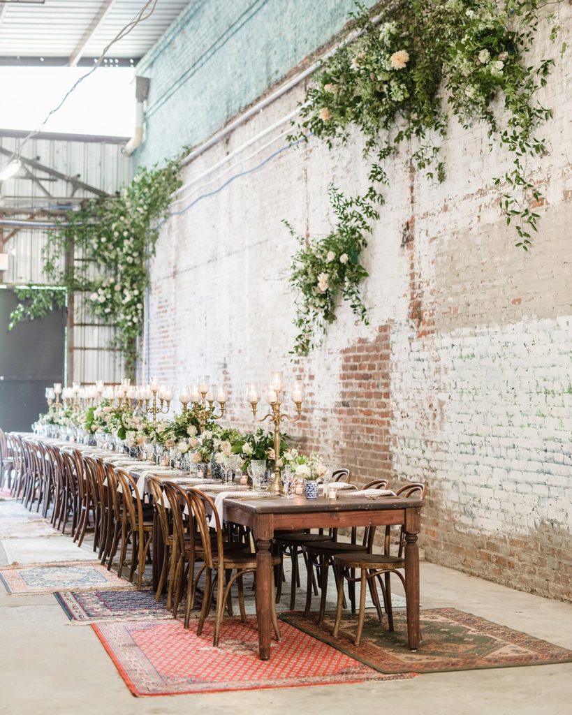 farm house table at A Modern Industrial Warehouse Wedding in New Orleans