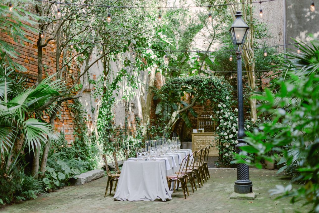 Courtyard seated dinner at New Orleans Pharmacy Museum 