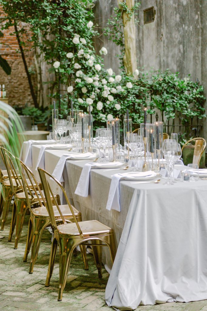 long tables with white roses