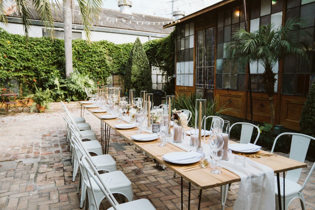 intimate seated dinner in outdoor courtyard in New Orleans