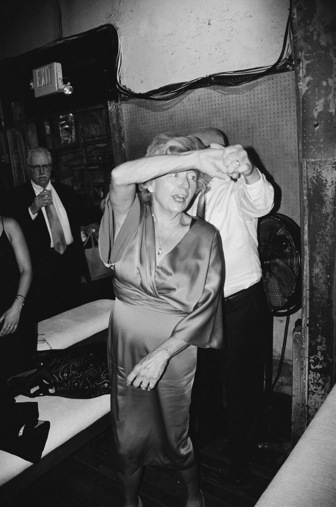 Couple dancing at Preservation Hall in a black and white image